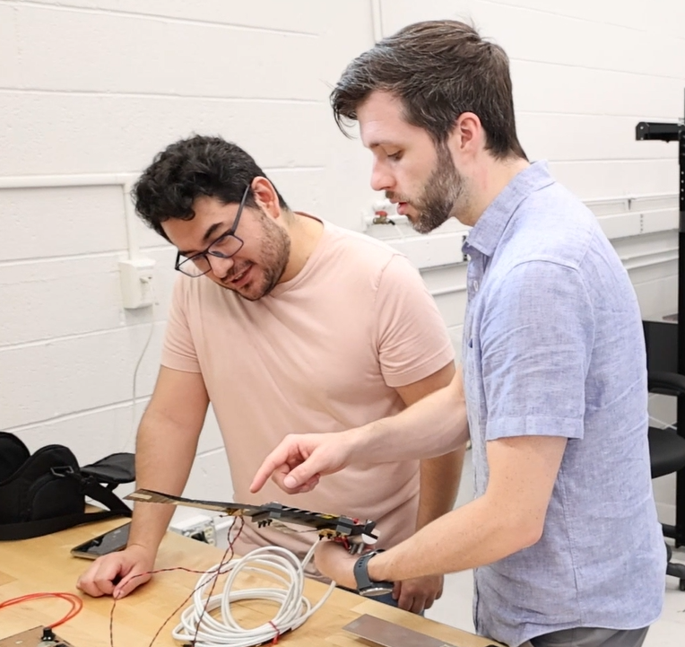 Miguel and Dr. Musgrave working with a bio-inspired prototype
